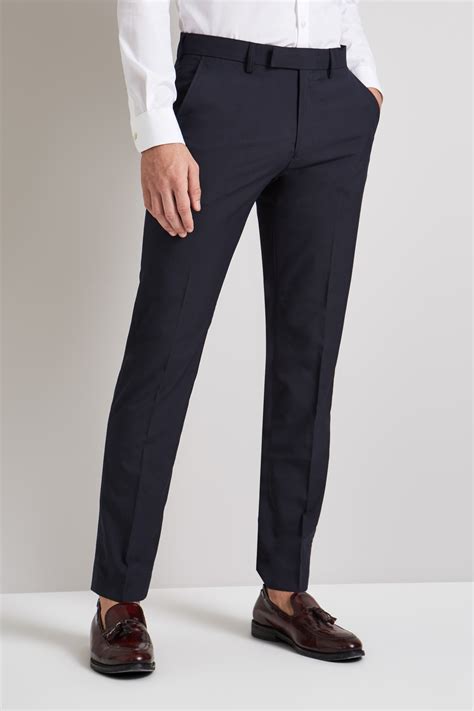 elegant navy blue trousers.